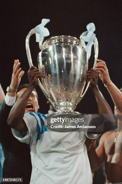 S Basile Boli holds the trophy after his team won the 1993 UEFA Champions League Final against AC Milan 1-0.