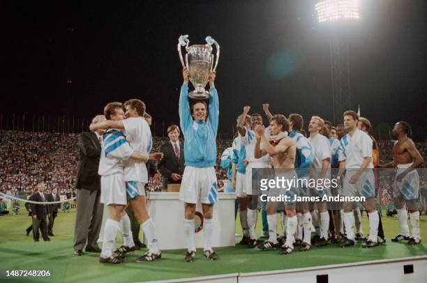 Podium of the final of the Champions Cup , season 1992-1993, between Marseille and AC Milan. Marseille won 1-0. The Marseille team holds the trophy.