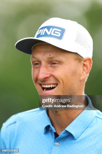 Adrian Meronk of Poland smiles on the practice range ahead of the Pro-Am prior to the DS Automobiles Italian Open at Marco Simone Golf Club on May...