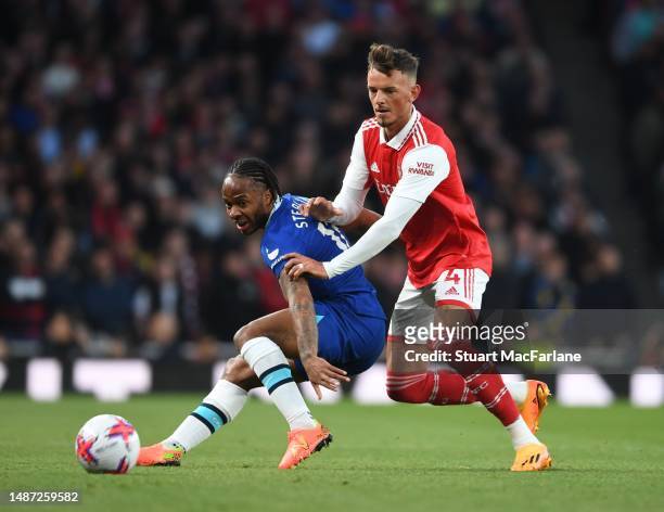Ben White of Arsenal challenged Raheem Sterling of Chelsea during the Premier League match between Arsenal FC and Chelsea FC at Emirates Stadium on...