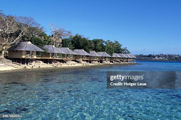 over-water bungalows at iririki island resort. - shefa stock pictures, royalty-free photos & images