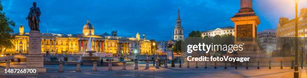 london panoramic view across trafalgar square illuminated at dusk westminster - national portrait gallery london stock pictures, royalty-free photos & images