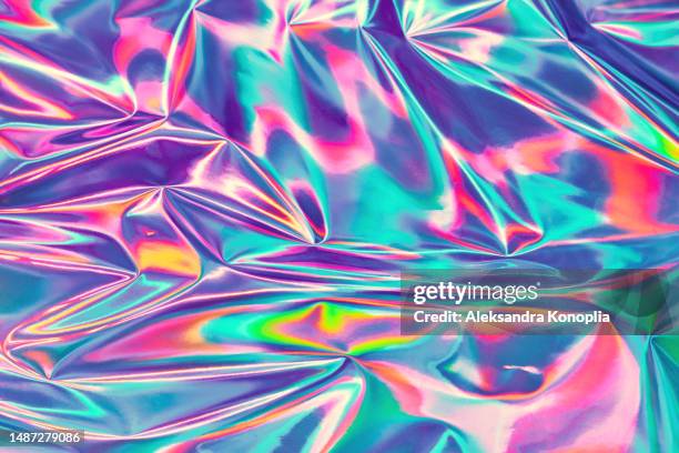 bold neon colored abstract psychedelic new wave background. saturated trippy mint blue, pink purple, red metallic holographic texture. retro futuristic, optimistic kawaii design - drug gefabriceerd object stockfoto's en -beelden