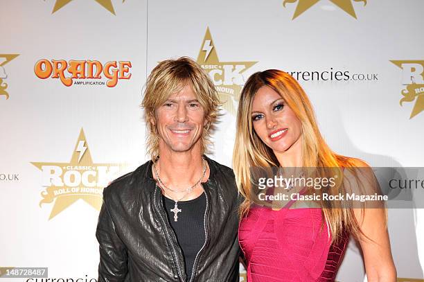 Duff McKagan and Susan Holmes attend the Classic Rock Roll of Honour Awards at The Roundhouse on November 9, 2011 in London.