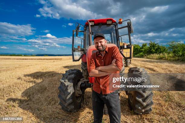 farmer standing with arms crossed - farmer arms crossed stock pictures, royalty-free photos & images