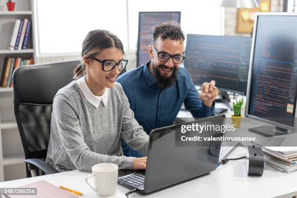 software programmers analyzing html code and database, brainstorming script ideas to develop new security system. engineers working with coding language collaborating on group project - html code stock pictures, royalty-free photos & images