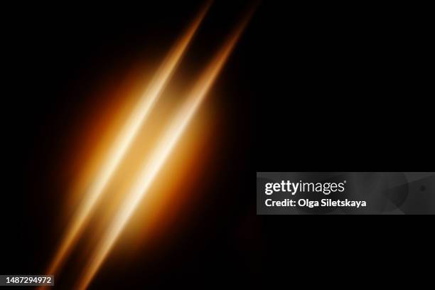 bright rays on a black background. flash light - igniting photos et images de collection