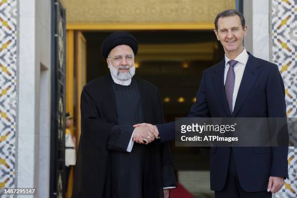 Syria's President Bashar al-Assad officially welcomed Iran President Ebrahim Raisi at Syrian Presidential Palace on May 03, 2023 in Damascus, Syria.