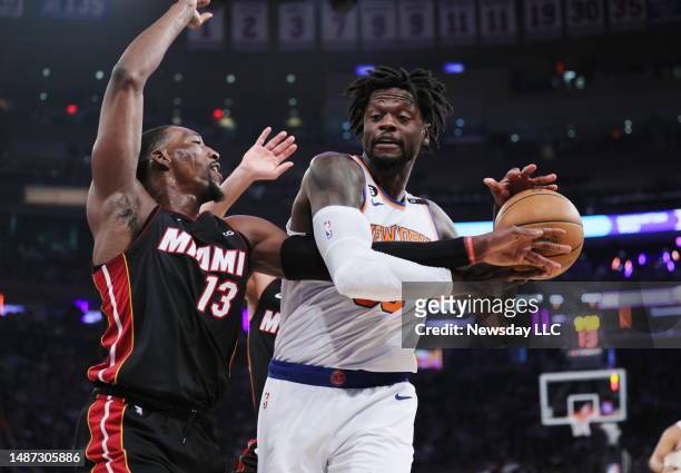 Miami Heat center Bam Adebayo defends New York Knicks forward Julius Randle in the 1st quarter during Game Two of the Eastern Conference Semifinal...
