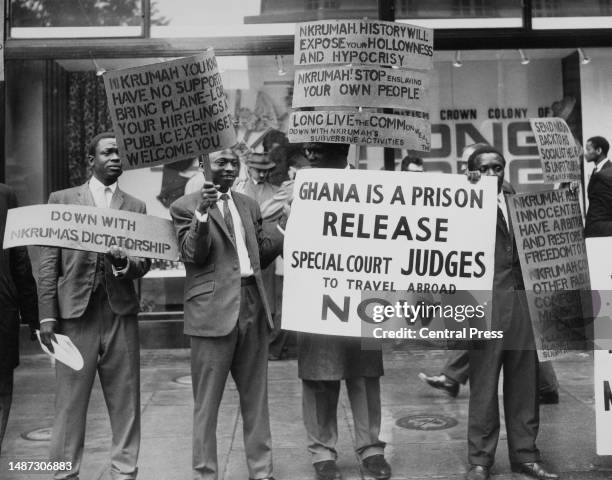 Ghanaian men protest against the President of Ghana Dr. Nkrumah outside Marlborough House - where commonwealth leaders are gathered for a conference....