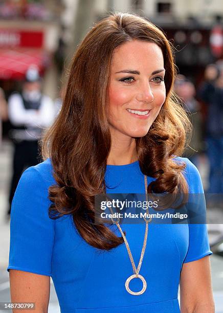 Catherine, Duchess of Cambridge in her role as patron, visits the 'Road to 2012: Aiming High' exhibition at the National Portrait Gallery on July 19,...