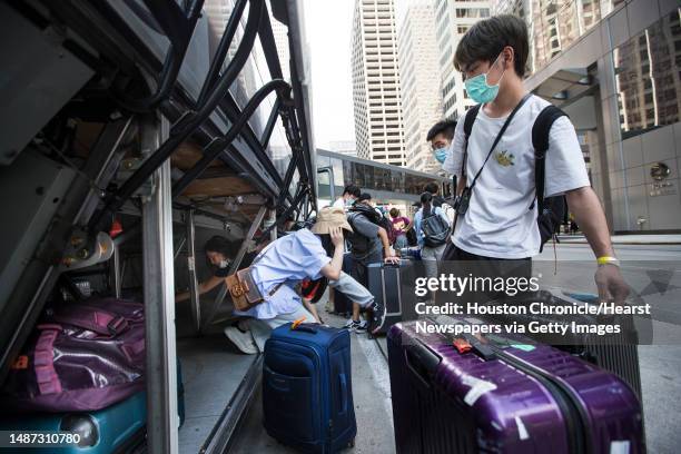 Group of international students from Tulane University are dropped off at the downtown Hyatt after evacuating New Orleans in the aftermath of...