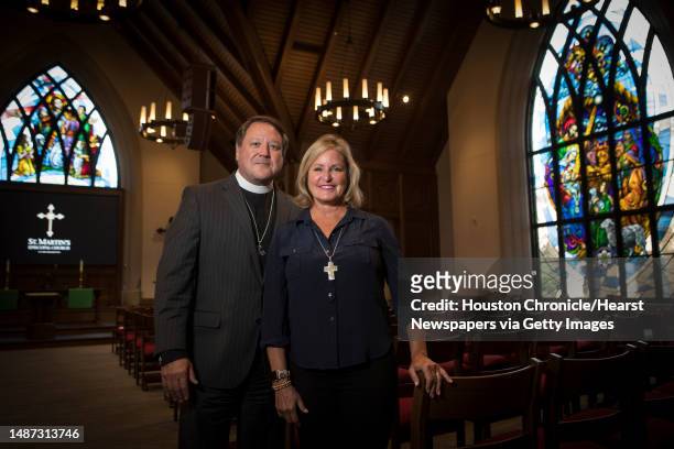 The Rev. Dr. Russell Levenson, rector at St. Martin's Episcopal Church, and his wife, Laura, pose for a portrait in the church's new Parish Life...