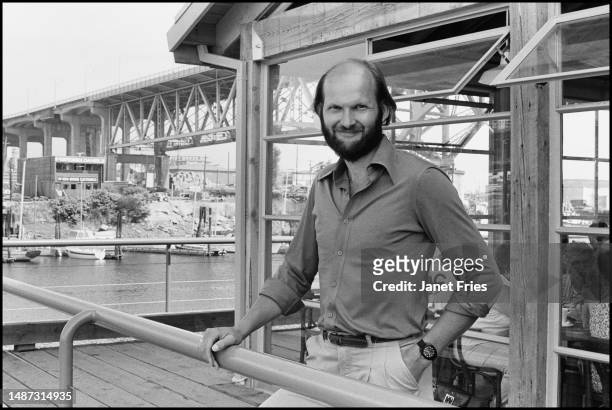 Portrait of Canadian architect Norman Hotson as he poses on the balcony of a restaurant, Vancouver, British Columbia, August 1979.