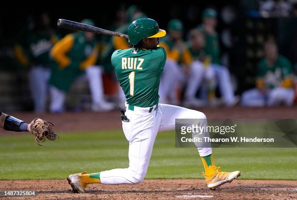 Esteury Ruiz of the Oakland Athletics hits an rbi double scoring Tony Kemp against the Seattle Mariners in the bottom of the six inning at...