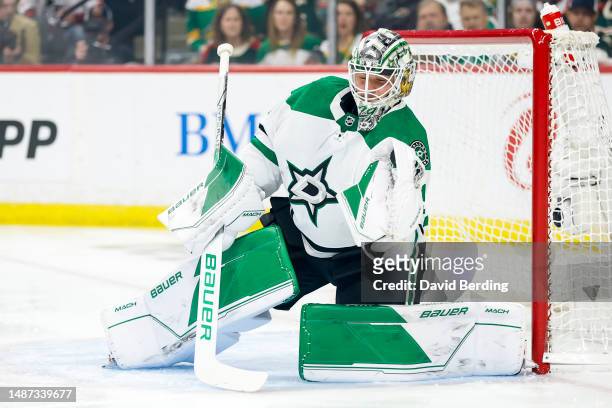 Jake Oettinger of the Dallas Stars makes a save against the Minnesota Wild in the first period in Game Six of the First Round of the 2023 Stanley Cup...