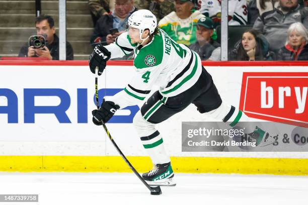 Miro Heiskanen of the Dallas Stars passes the puck against the Minnesota Wild in the first period in Game Six of the First Round of the 2023 Stanley...