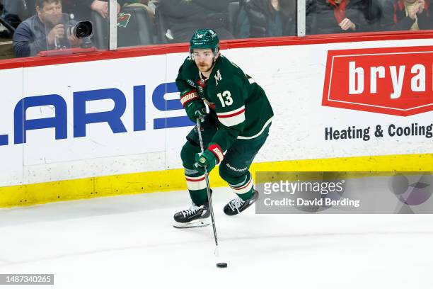 Sam Steel of the Minnesota Wild skates with the puck against the Dallas Stars in the third period in Game Six of the First Round of the 2023 Stanley...