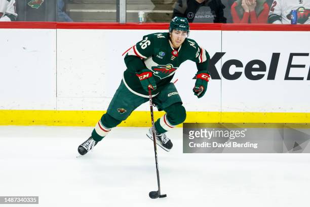 Connor Dewar of the Minnesota Wild skates with the puck against the Dallas Stars in the third period in Game Six of the First Round of the 2023...