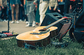 Acoustic guitar on the grass