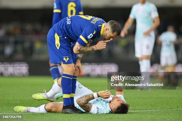 Federico Ceccherini of Hellas Verona clashes with Lautaro Martinez of FC Internazionale during the Serie A match between Hellas Verona and FC...