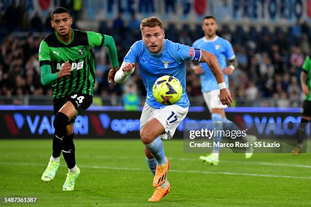 Ciro Immobile of SS Lazio compete for the ball with Ruan Tresoldi Netto of US Sassuolo during the Serie A match between SS Lazio and US Sassuolo at...