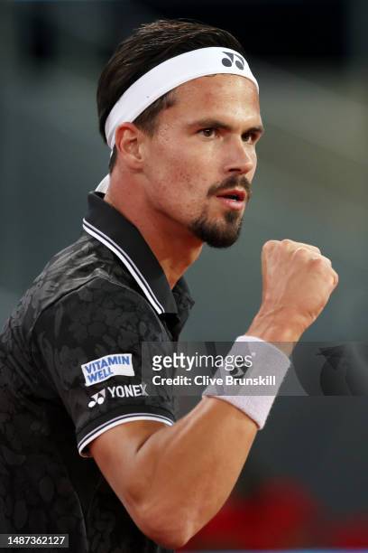 Daniel Altmaier of Germany celebrates against Borna Coric of Croatia during the Men's Quarter-Final match on Day Ten of the Mutua Madrid Open at La...