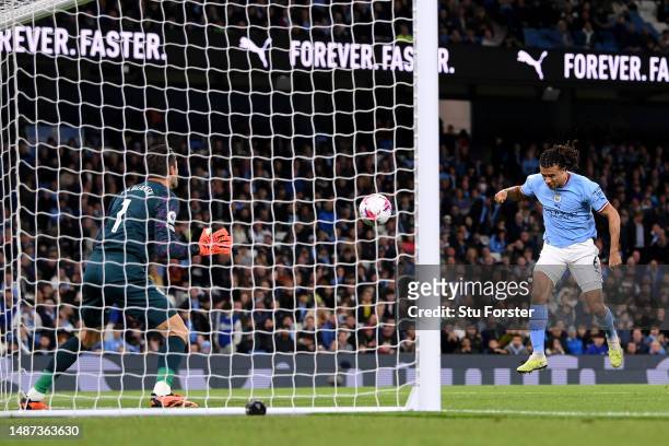 Nathan Ake of Manchester City scores the team's first goal during the Premier League match between Manchester City and West Ham United at Etihad...