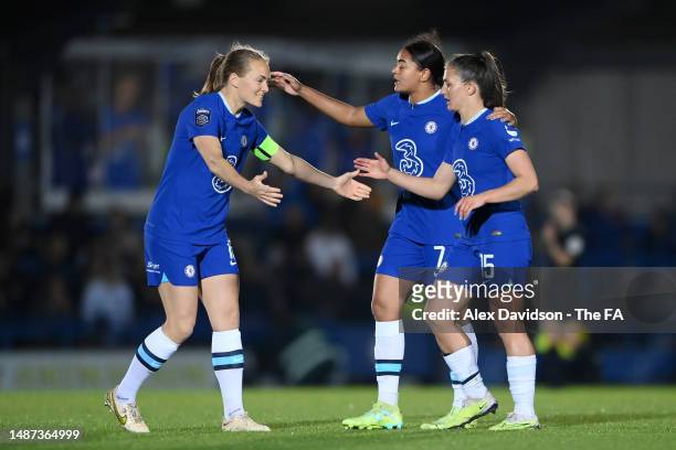 Magdalena Eriksson of Chelsea celebrates with teammates Jess Carter and Eve Perisset after the team's victory in the FA Women's Super League match...