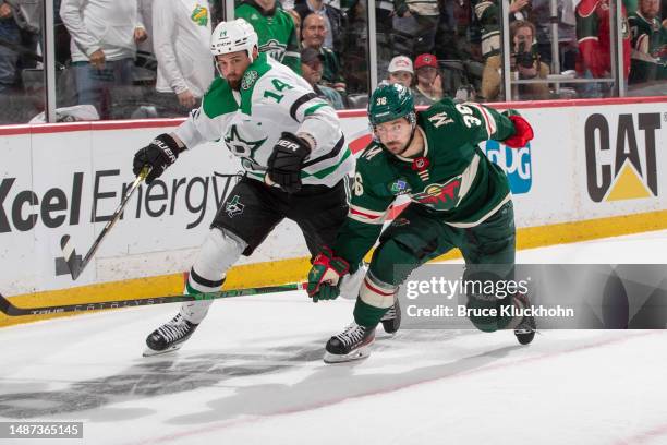 Jamie Benn of the Dallas Stars skates past Mats Zuccarello of the Minnesota Wild in the third period of Game Six of the First Round of the 2023...