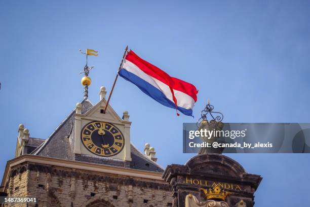 delft city hall at king’s day - dutch language stock pictures, royalty-free photos & images