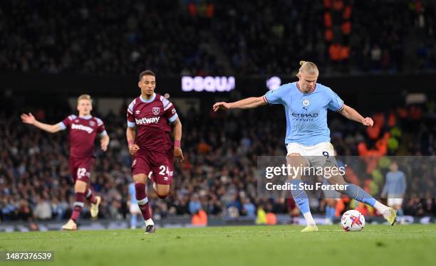 Manchester City striker Erling Haaland shoots to score the 2nd City goal and his record breaking 35th Premier League goal of the season during the...