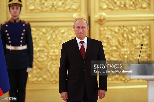 Russian President Vladimir Putin receives King Juan Carlos I of Spain in the Grand Kremlin Palace on July 19, 2012 in Moscow, Russia. During a state...