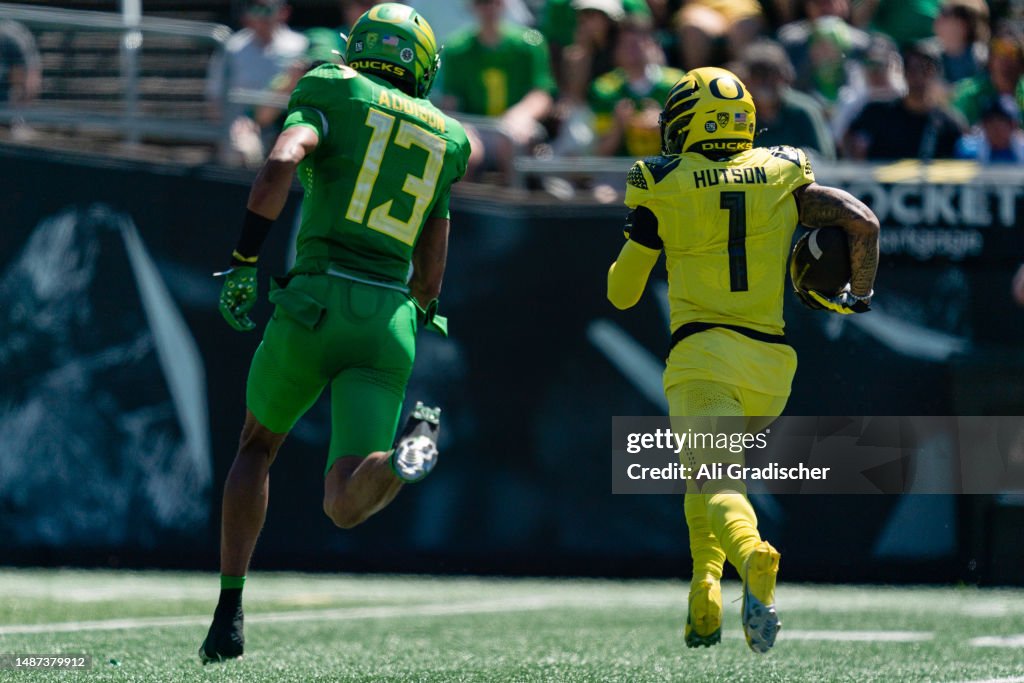 Defensive back Bryan Addison of the Oregon Ducks tries to run down ...