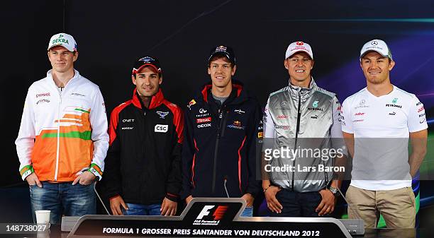 Nico Hulkenberg of Germany and Force India, Timo Glock of Germany and Marussia, Sebastian Vettel of Germany and Red Bull Racing, Michael Schumacher...