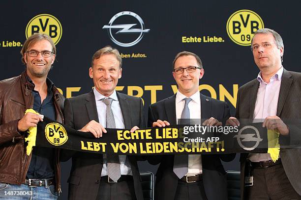 German first division Bundesliga football club Dortmund's head coach Juergen Klopp, Dortmund's General Manager Hans-Joachim Watzke, Interim CEO and...