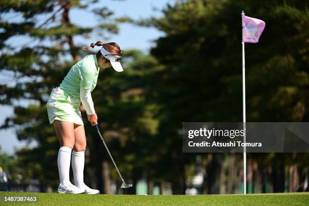 Nanoko Hayashi of Japan attempts a putt on the 1st green during the first round of World Ladies Championship Salonpas Cup at Ibaraki Golf Club West...