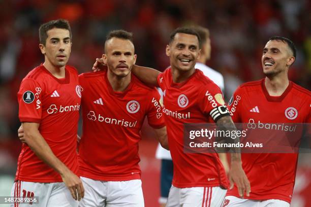 Carlos De Peña of Internacional reacts with teammates after scoring theduring a Copa CONMEBOL Libertadores 2023 Group B match between Internacional...