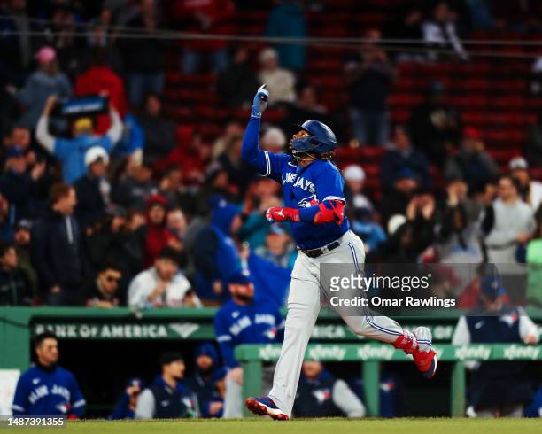 Vladimir Guerrero Jr. #27 of the Toronto Blue Jays reacts after hitting a solo home run at the top of the third inning against the Boston Red Sox at...