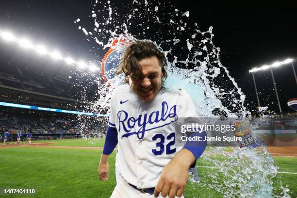 Nick Pratto of the Kansas City Royals is doused with water after the Royals defeated the Baltimore Orioles 6-0 to win the game at Kauffman Stadium on...