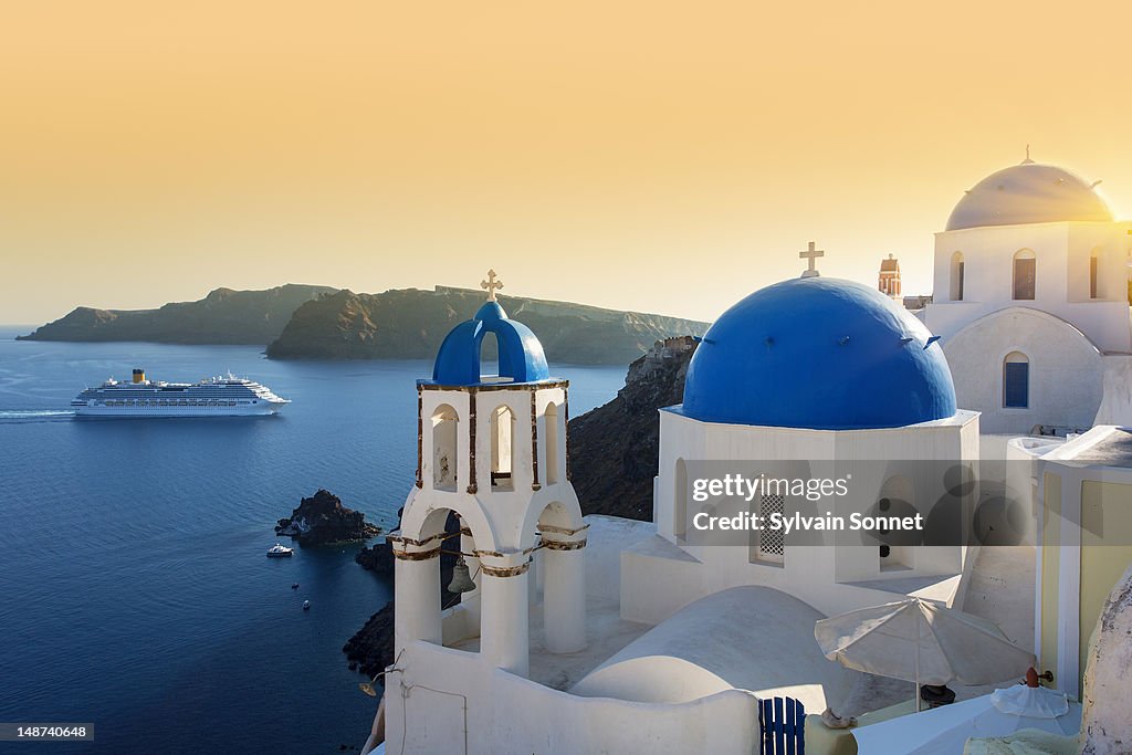 Blue domed churches at sunset, Oia, Santorini