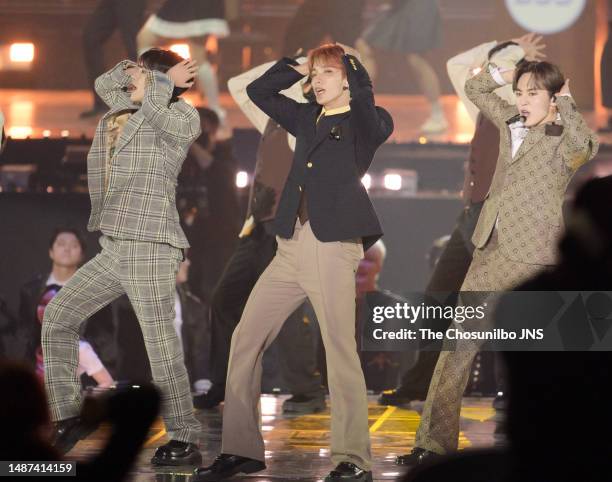 Hoshi, Dokyeom, and Seungkwan of k-pop boy group SEVENTEEN are performing during the 12th Circle Chart Music Awards at the KSPO Dome on February 18,...