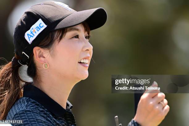 Erika Kikuchi of Japan smiles after holing out on the 18th green during the first round of World Ladies Championship Salonpas Cup at Ibaraki Golf...