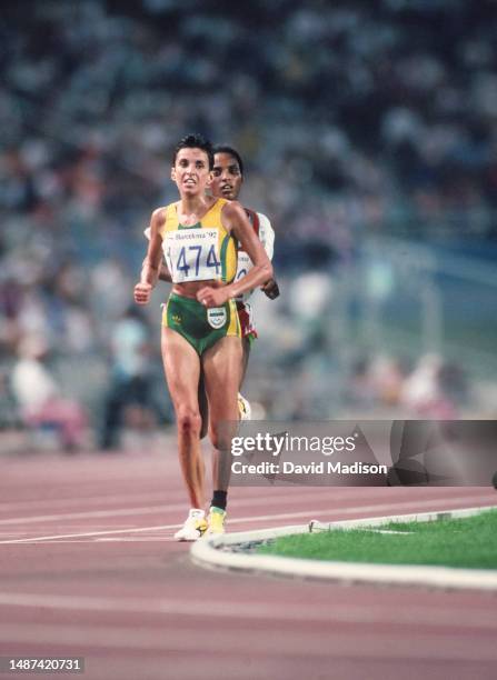 Derartu Tulu of Ethiopia and Elana Meyer of South Africa run in the Women's 10000 meters race of the Athletics competition at the 1992 Summer...