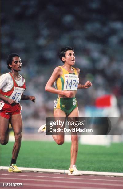 Derartu Tulu of Ethiopia and Elana Meyer of South Africa run in the Women's 10000 meters race of the Athletics competition at the 1992 Summer...