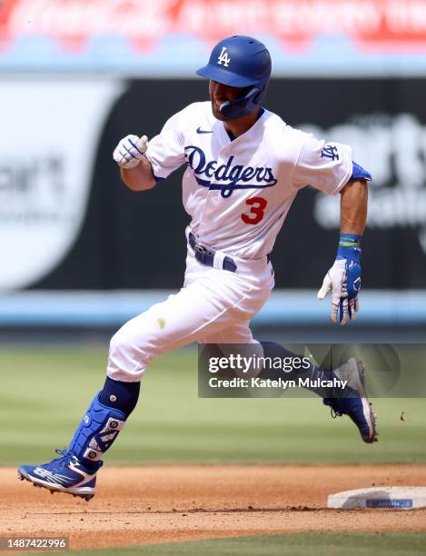 Chris Taylor of the Los Angeles Dodgers runs to third base after hitting a triple during the seventh inning against the Philadelphia Phillies at...