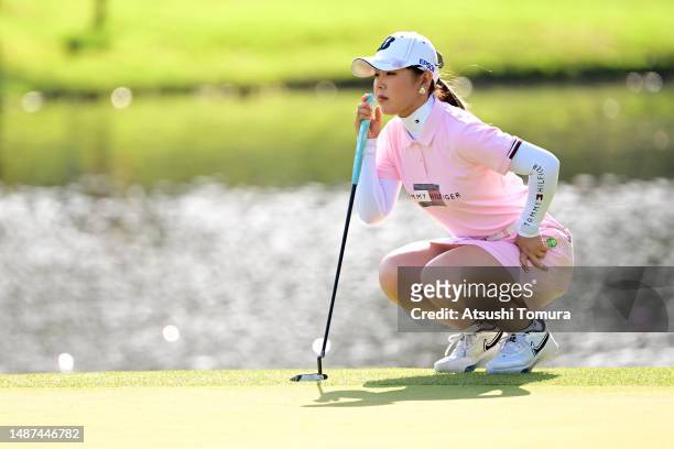 Yuri Yoshida of Japan lines up a putt on the 15th green during the first round of World Ladies Championship Salonpas Cup at Ibaraki Golf Club West...