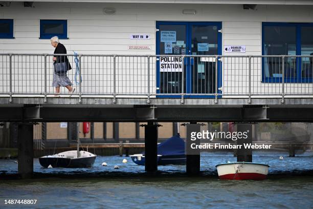 People are seen at North Haven Yacht Club Polling station at Sandbanks, as people go to the polls in the local elections, on May 04, 2023 in Poole,...
