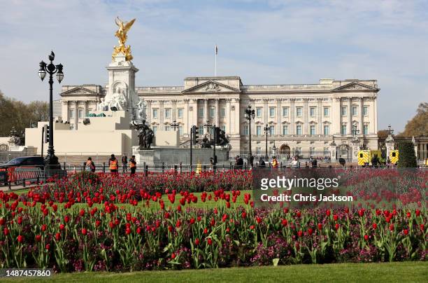 Flowers bloom in front of Buckingham Palace ahead of the coronation of King Charles III, which takes place on May 6th.
