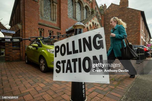 Woman enters a polling station at Festival Church in Chester city centre as voters go to the polls in local council elections on May 04, 2023 in...